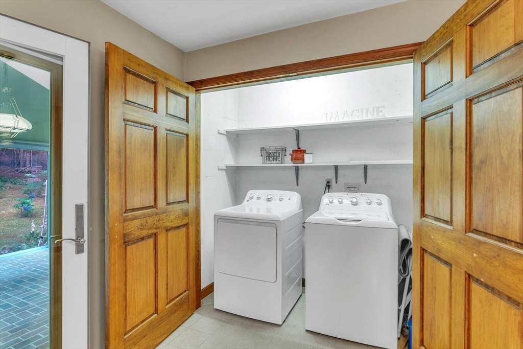 17 Church Road Huntington, MA 01050 - Photo 12 of 36 a view of storage and utility room with washer and dryer