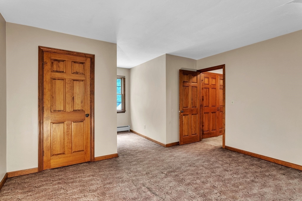 17 Church Road Huntington, MA 01050 - Photo 20 of 36 an empty room with closet area
