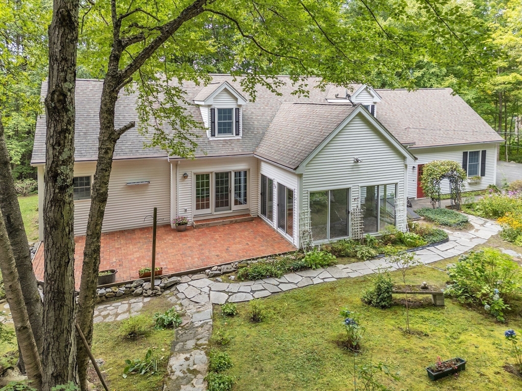 17 Church Road Huntington, MA 01050 - Photo 4 of 36 a front view of a house with a yard