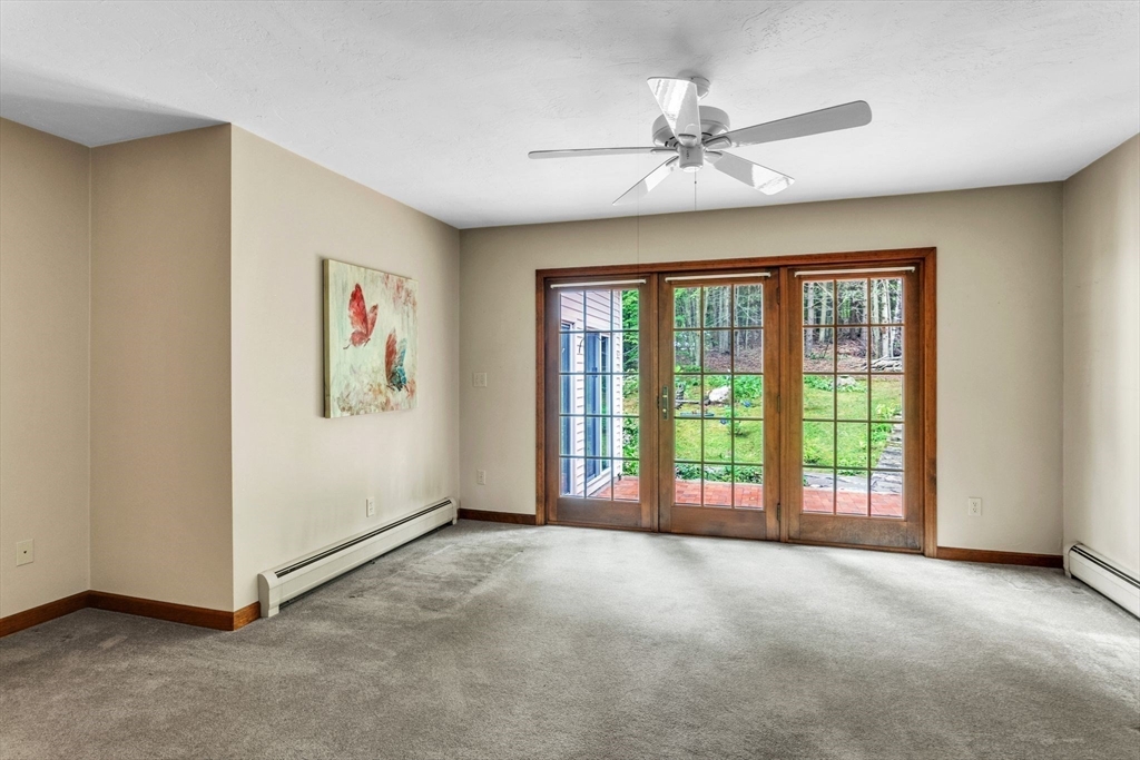 17 Church Road Huntington, MA 01050 - Photo 8 of 36 a view of an empty room with a window