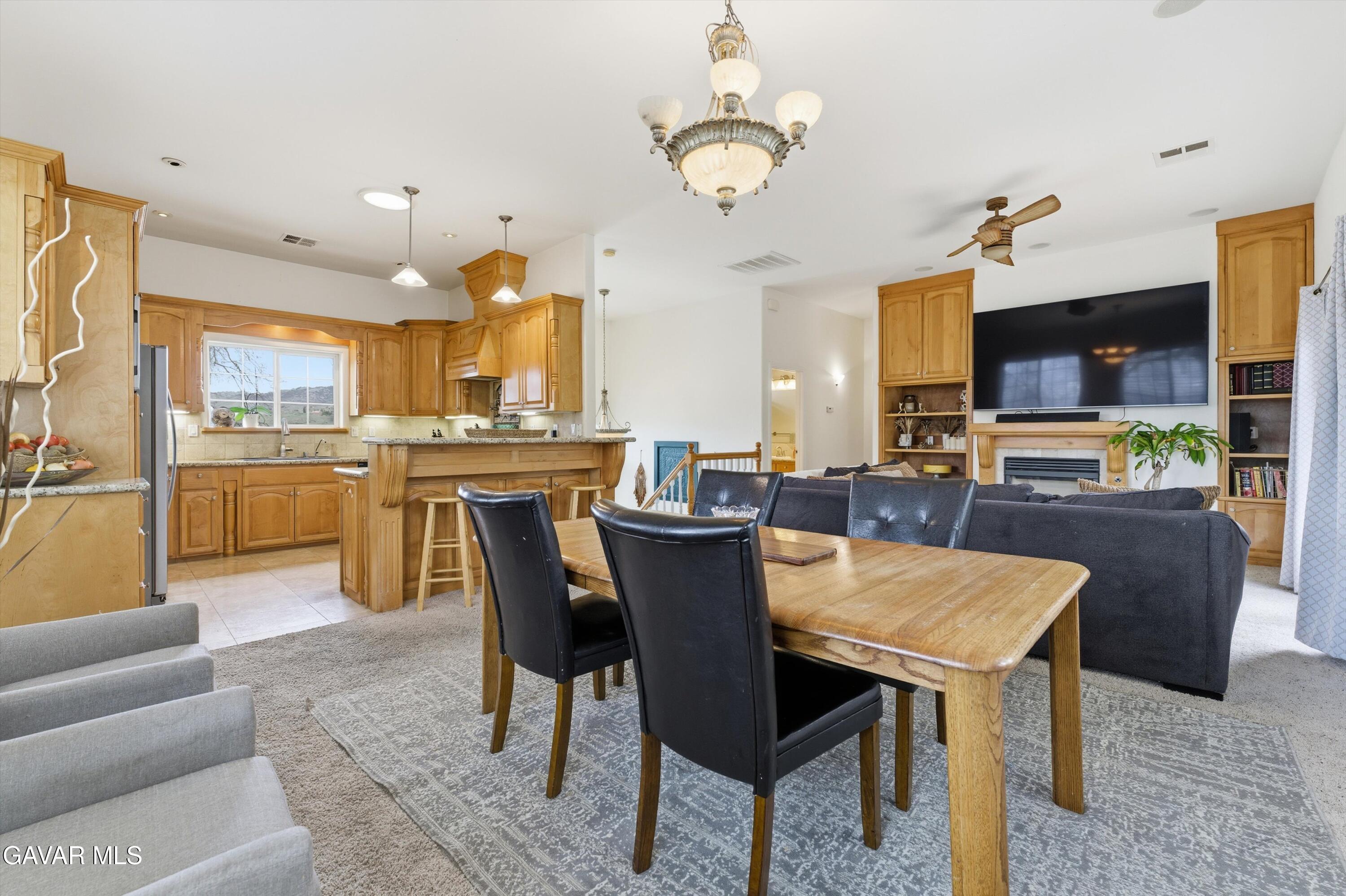 20000 Brite Valley Road Tehachapi, CA 93561 - Photo 6 of 32 a view of a dining room kitchen and a chandelier