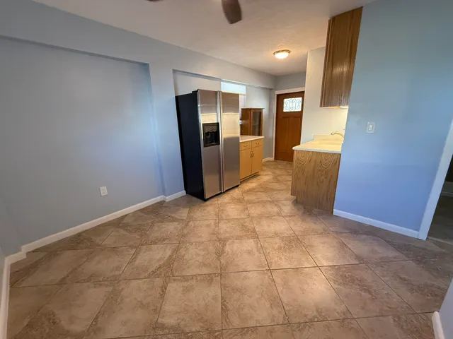 a view of a kitchen with a sink