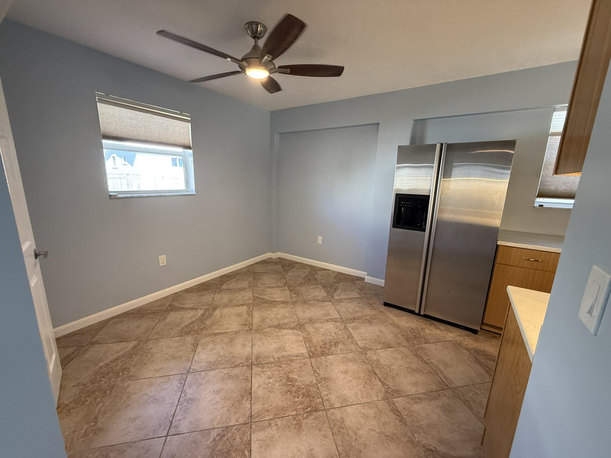 435 Collins Street Key Largo, FL 33037 - Photo 5 of 7 a view of an empty room and a kitchen