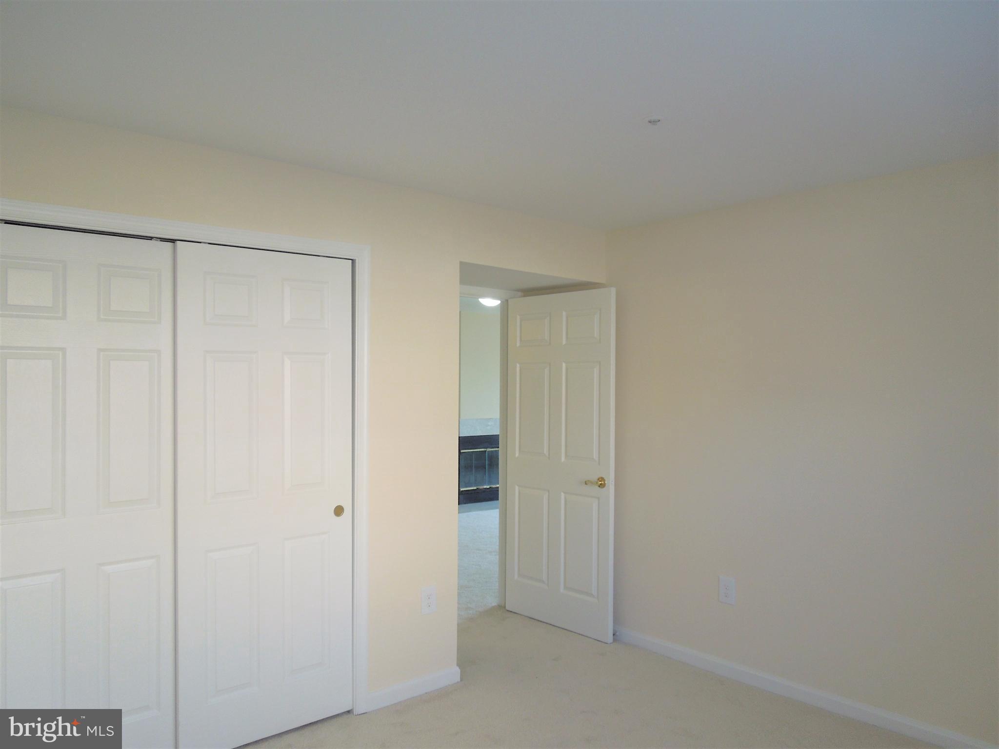 304 Ridgepoint Place, Unit 14 Gaithersburg, MD 20878 - Photo 15 of 25 a view of an empty room