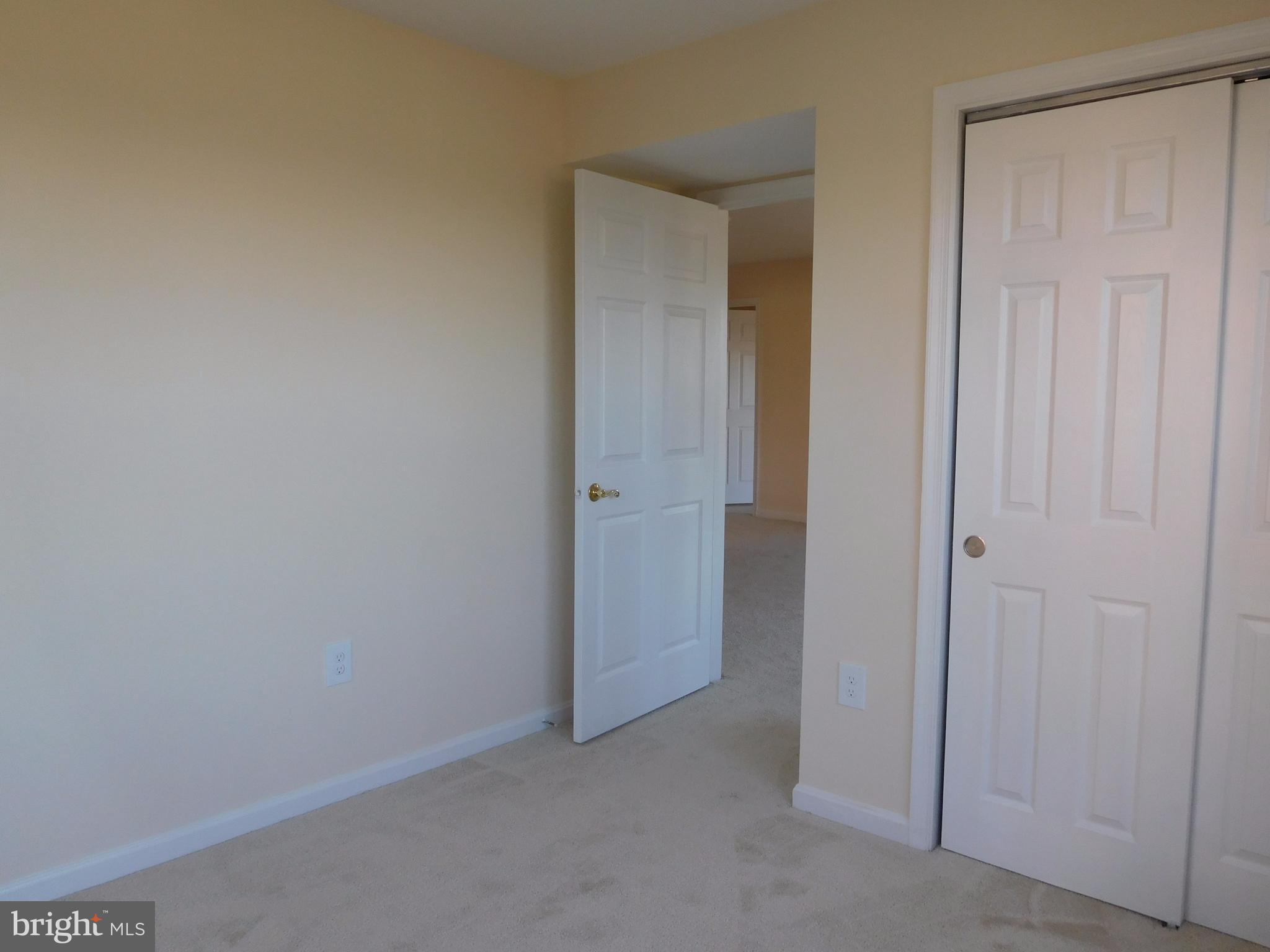 304 Ridgepoint Place, Unit 14 Gaithersburg, MD 20878 - Photo 16 of 25 a view of an empty room