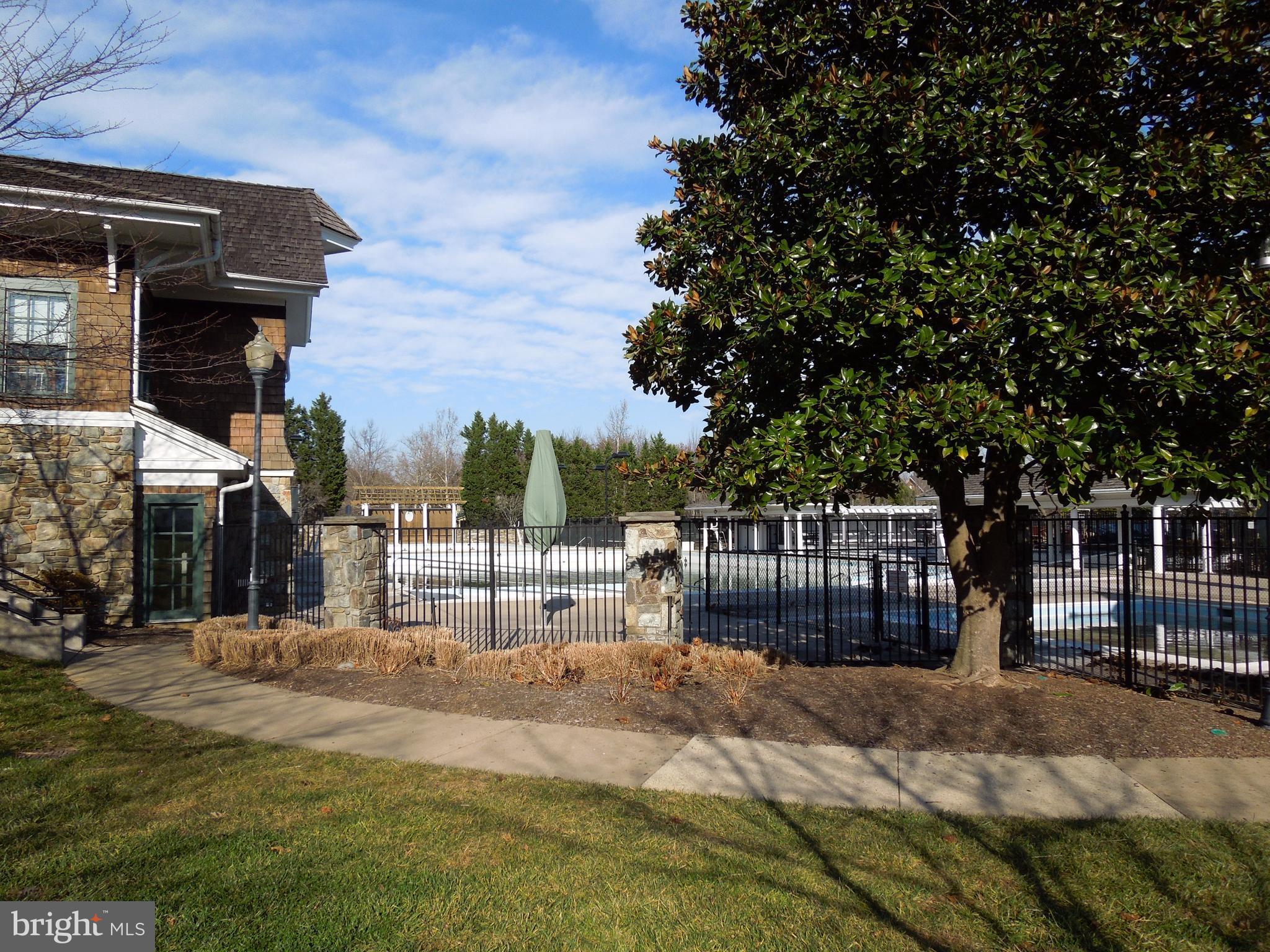 304 Ridgepoint Place, Unit 14 Gaithersburg, MD 20878 - Photo 22 of 25 a view of a house with a outdoor space