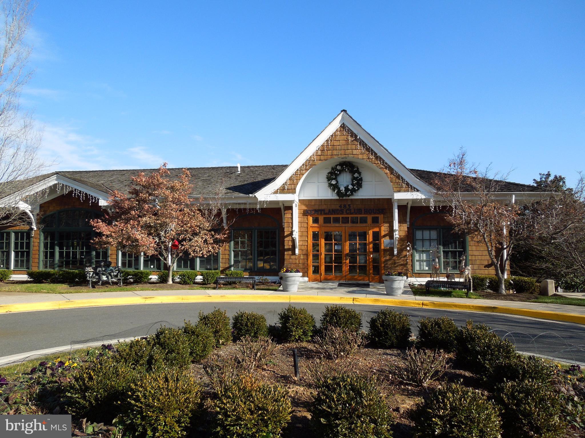 304 Ridgepoint Place, Unit 14 Gaithersburg, MD 20878 - Photo 24 of 25 a view of a building and a yard
