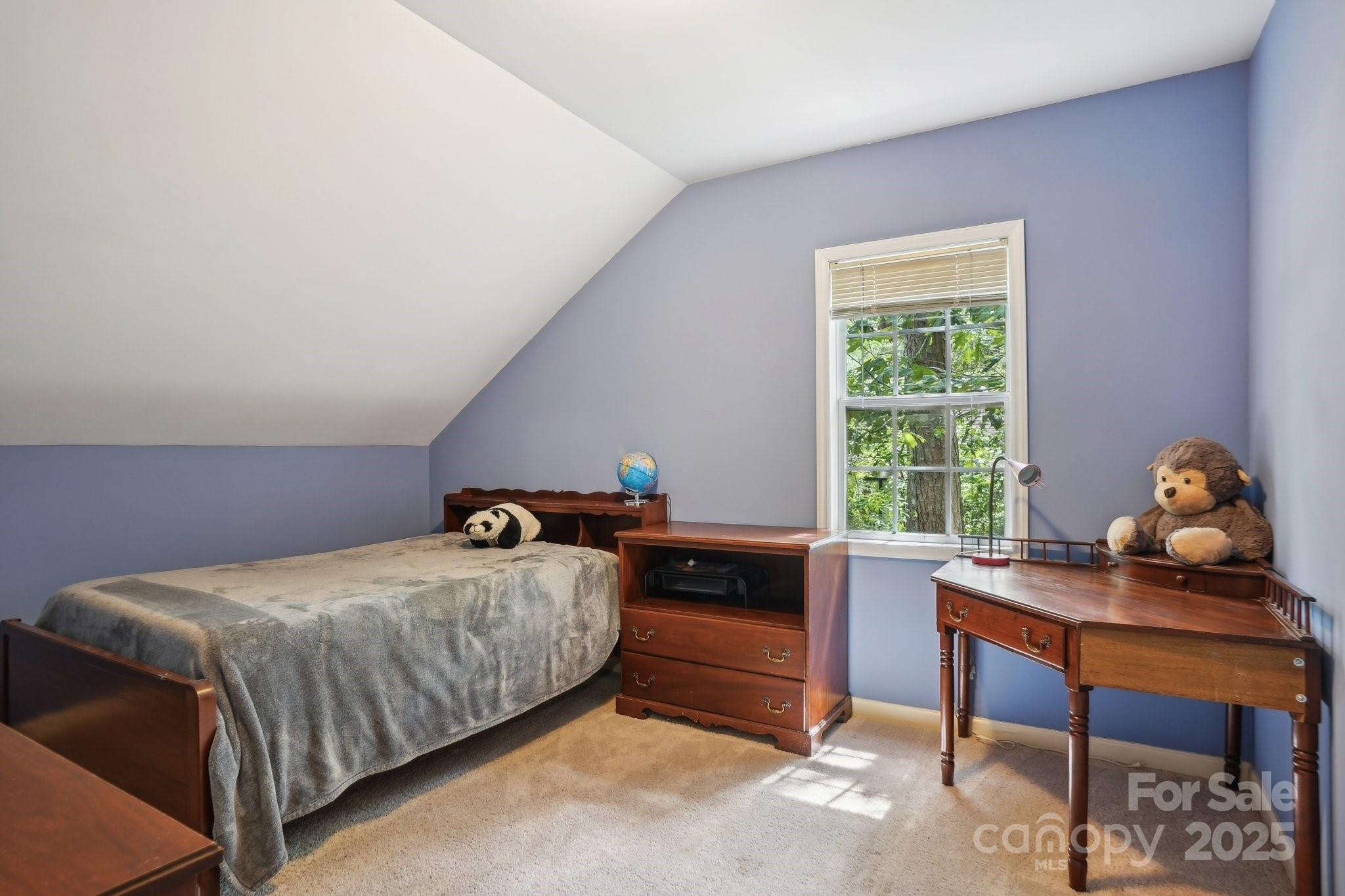 134 Lake Spring Loop Mooresville, NC 28117 - Photo 26 of 36 a bedroom with a bed and a window