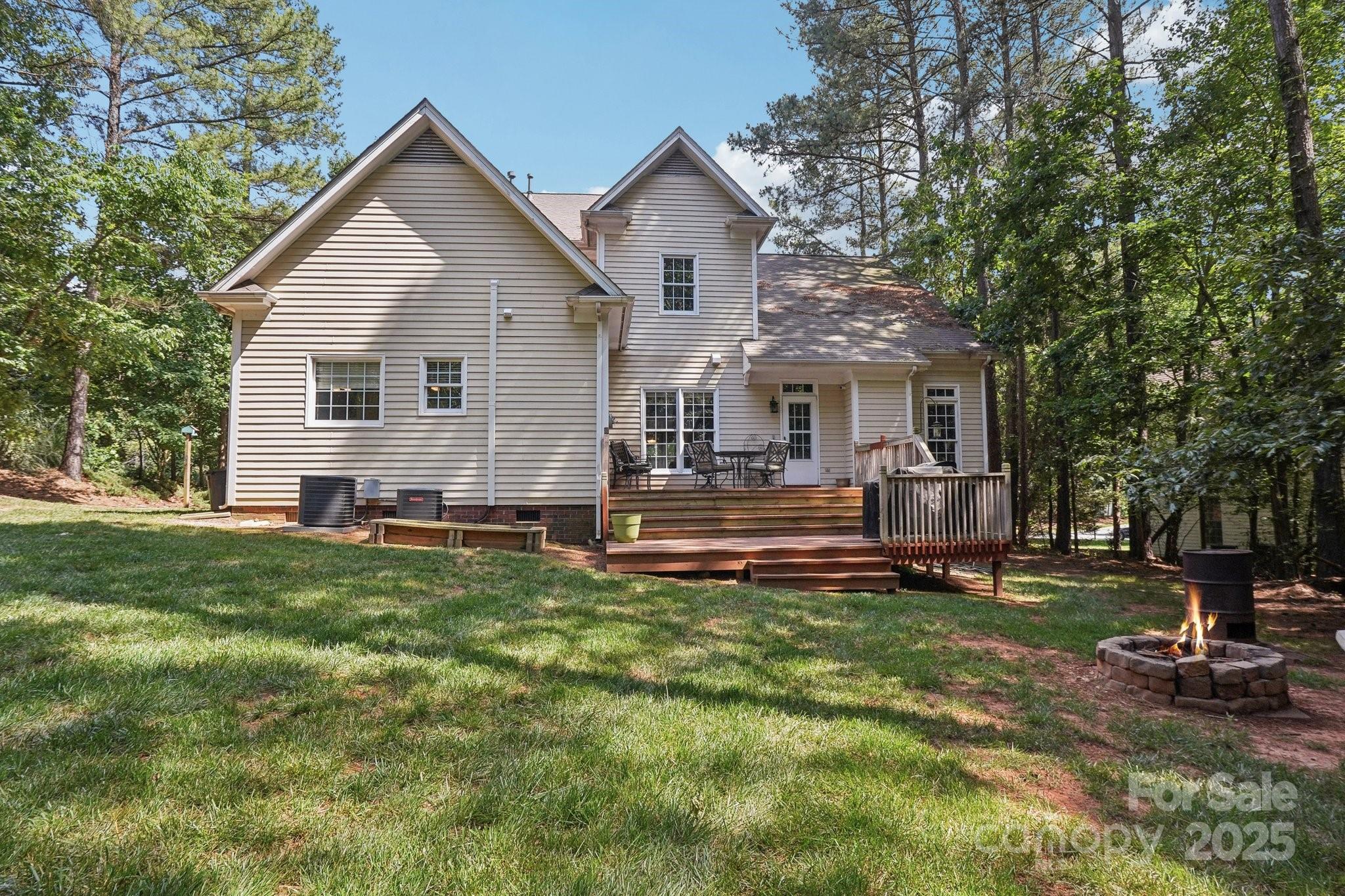 134 Lake Spring Loop Mooresville, NC 28117 - Photo 30 of 36 a front view of house with yard and green space