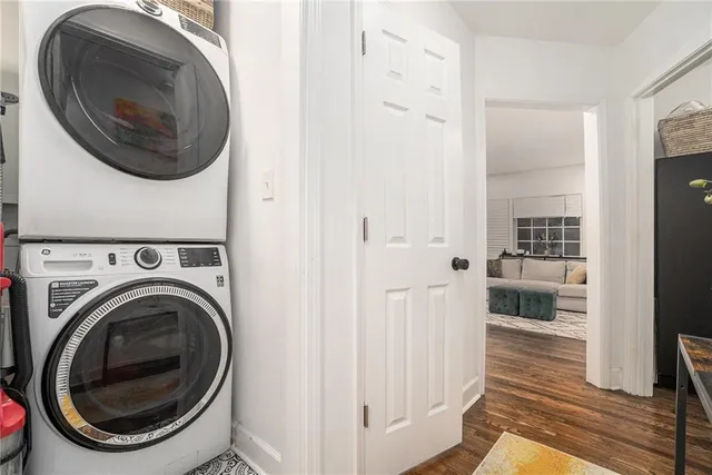 a view of a hallway with washer and dryer