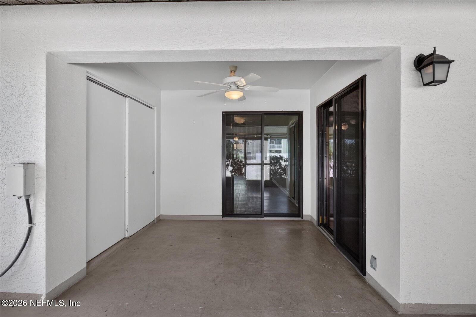 7360 Ulmerton Road, Unit 2E Largo, FL 33771 - Photo 29 of 67 7360 Back Porch Sliders2