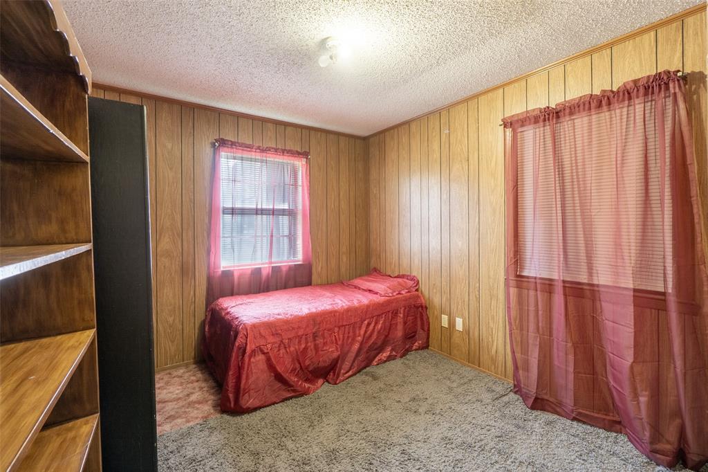 22330 State Highway 64 Canton, TX 75103 - Photo 13 of 33 a bedroom with a bed and a window