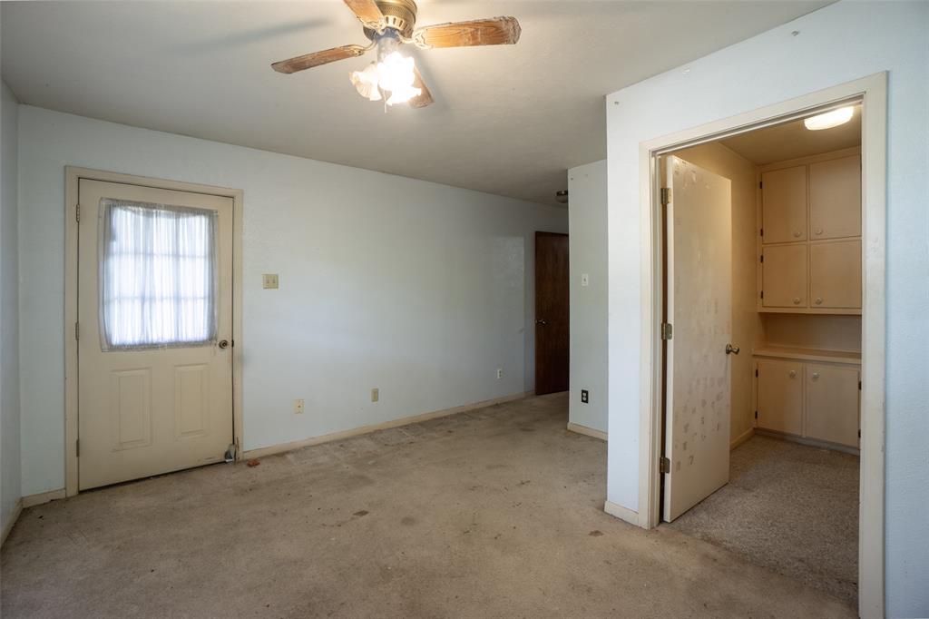 22330 State Highway 64 Canton, TX 75103 - Photo 18 of 33 an empty room with closet and a chandelier fan
