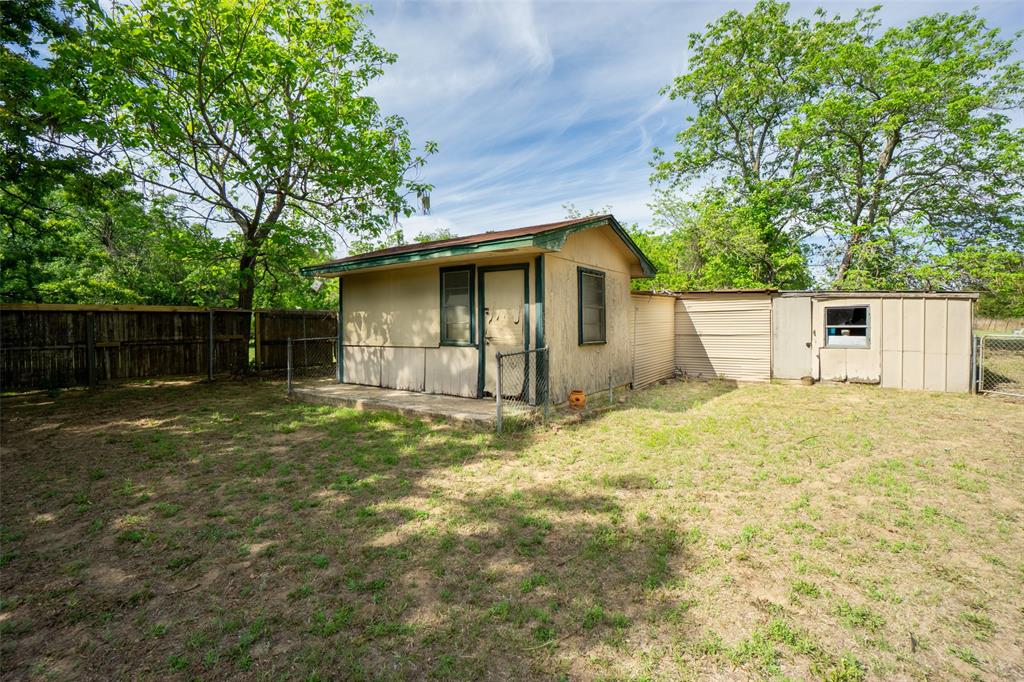 22330 State Highway 64 Canton, TX 75103 - Photo 24 of 33 front view of a house with a yard
