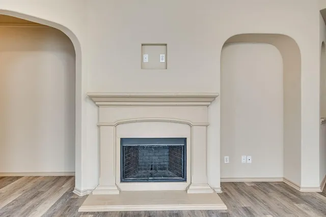 a large kitchen with stainless steel appliances granite countertop a large counter top and a stove