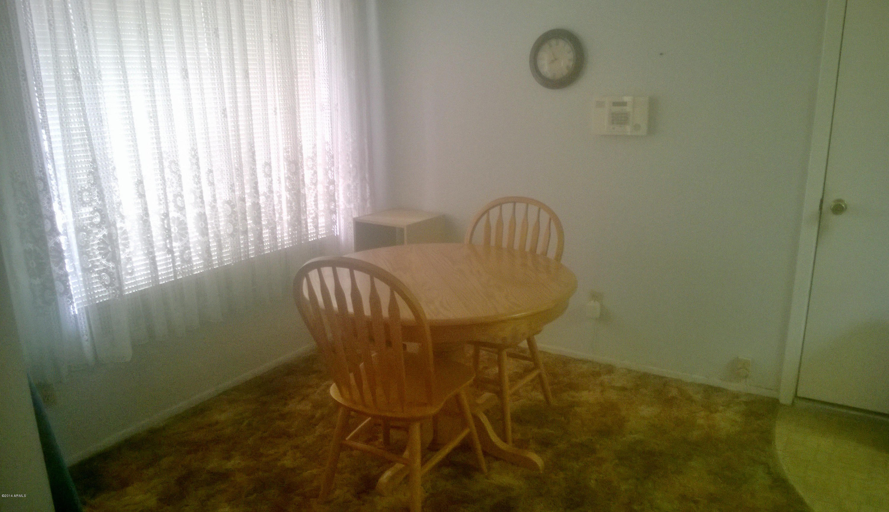 9515 West Mountain View Road, Unit A Peoria, AZ 85345 - Photo 13 of 21 Kitchen Dining Area