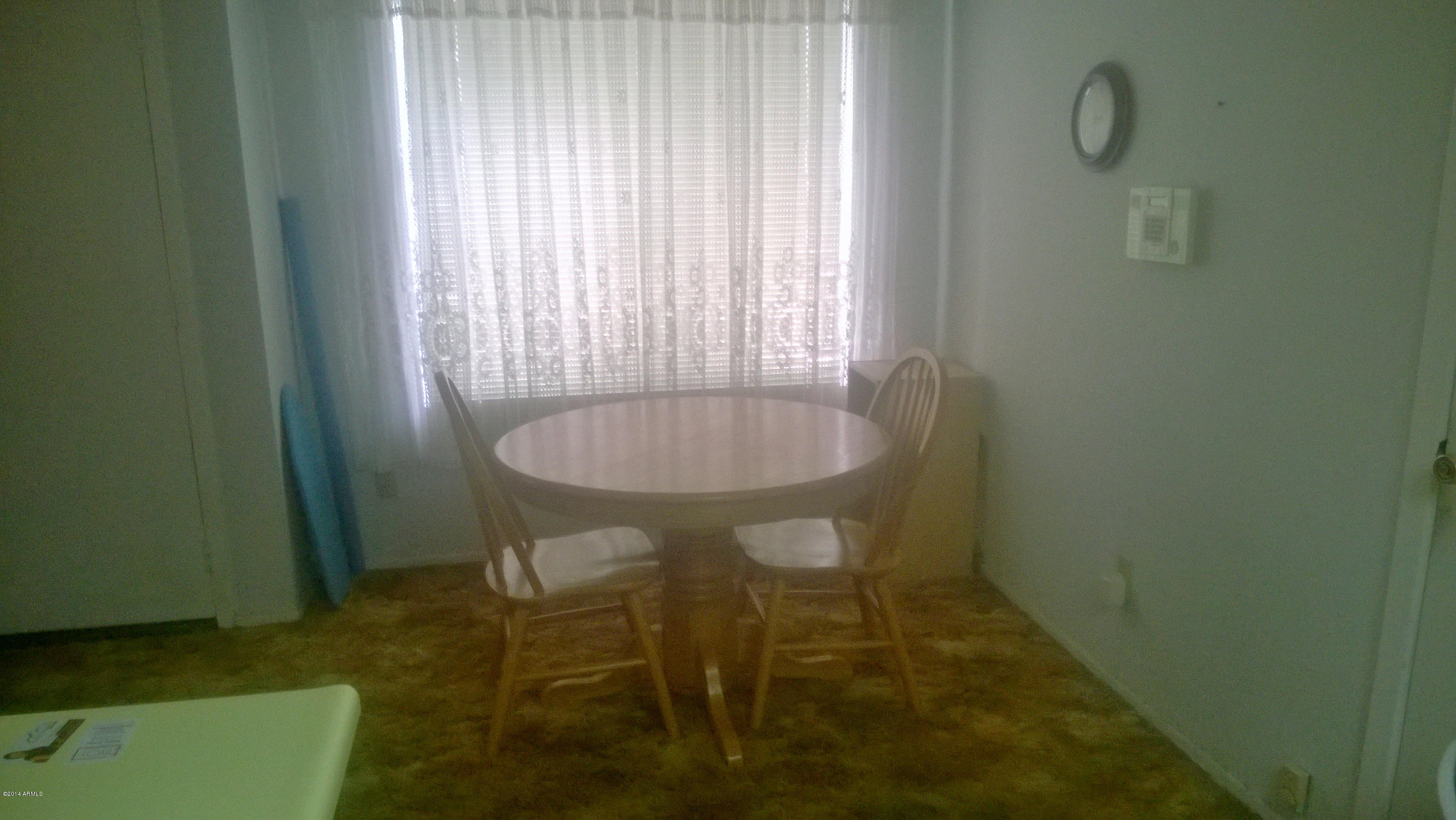 9515 West Mountain View Road, Unit A Peoria, AZ 85345 - Photo 3 of 21 Kitchen Dining Area