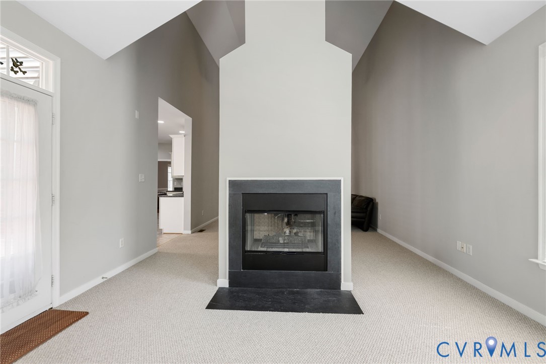 14225 Camack Trail Midlothian, VA 23114 - Photo 12 of 27 a living room with a fireplace