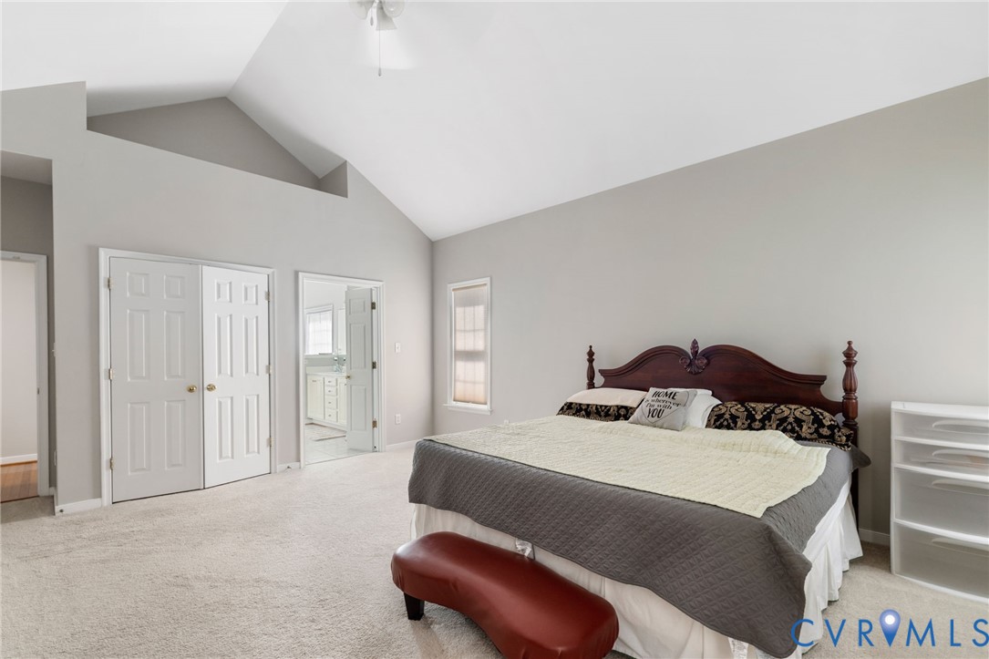 14225 Camack Trail Midlothian, VA 23114 - Photo 19 of 27 a bedroom with a bed and a couch