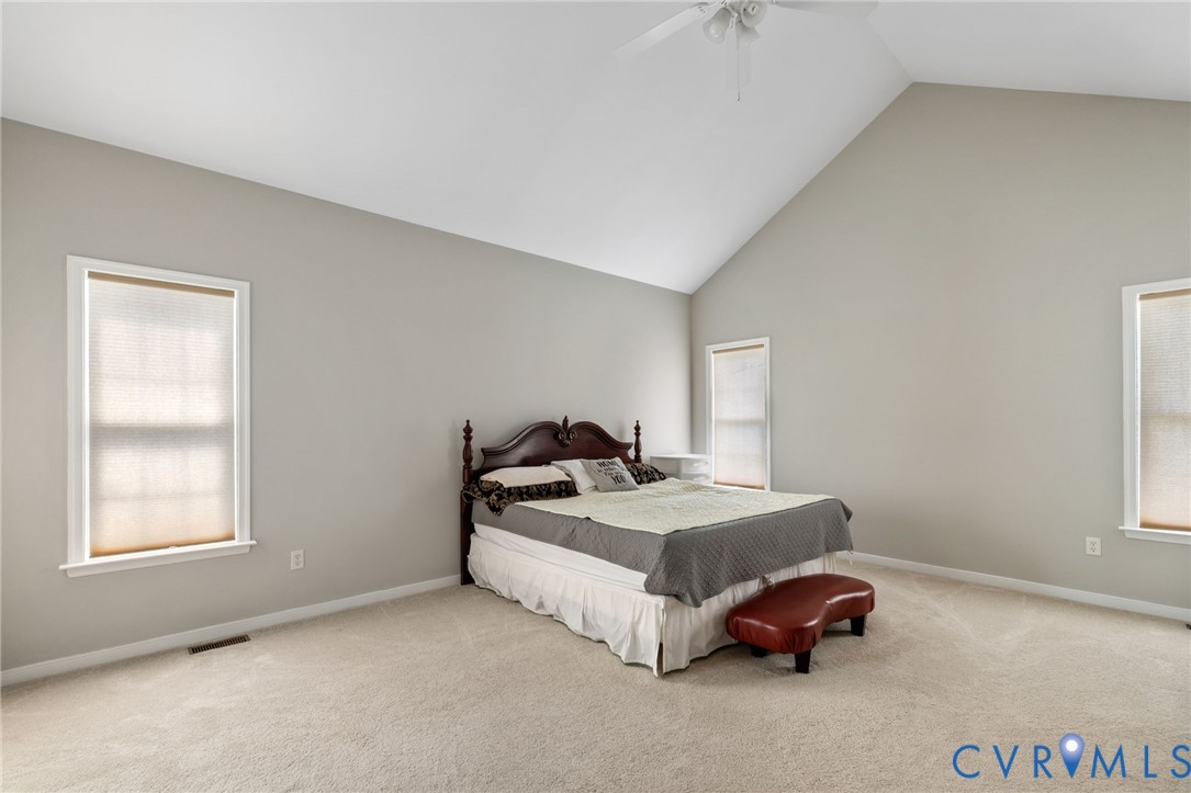 14225 Camack Trail Midlothian, VA 23114 - Photo 20 of 27 a bedroom with a bed and a window