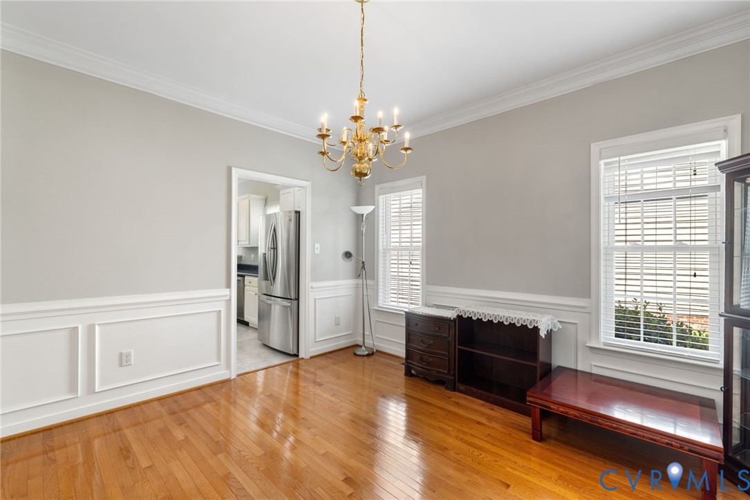 14225 Camack Trail Midlothian, VA 23114 - Photo 5 of 27 a spacious bedroom with a bed and a window