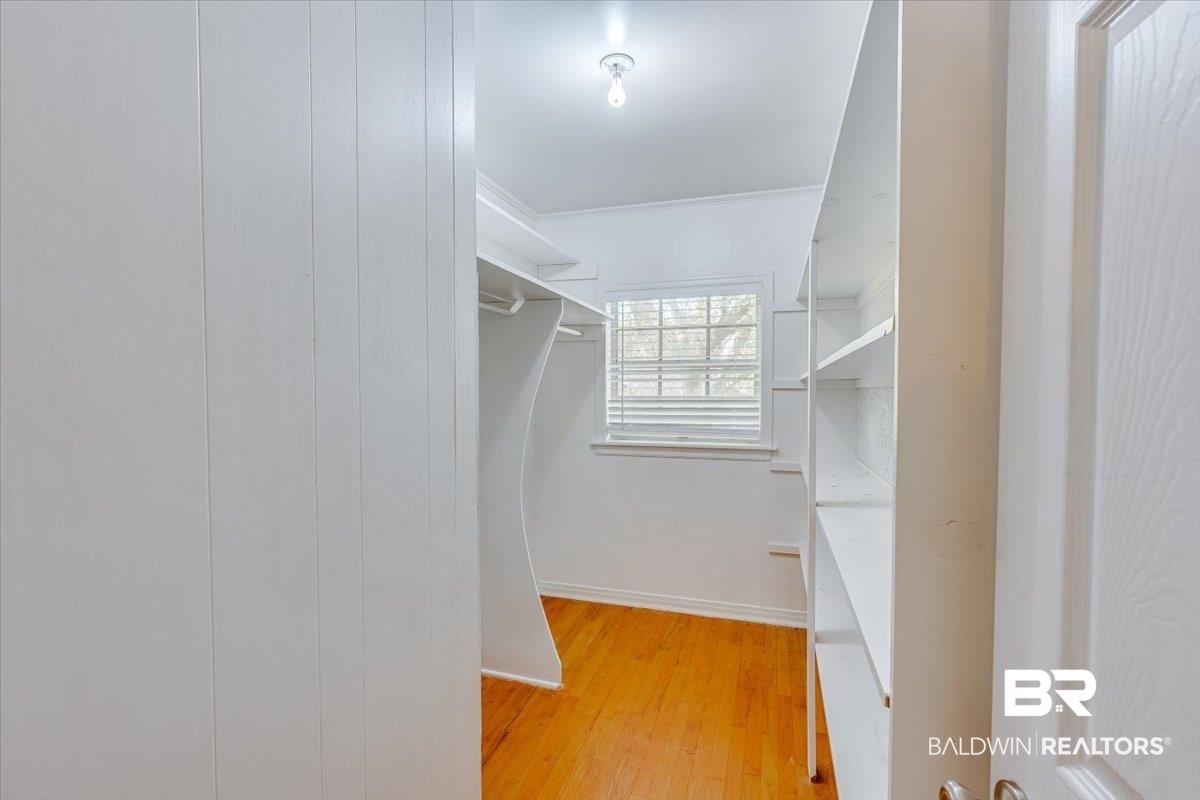 14160 Moffett Road Wilmer, AL 36587 - Photo 41 of 75 Spacious closet featuring light wood finished floors