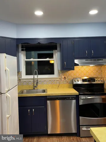 a car parked in the middle of a field