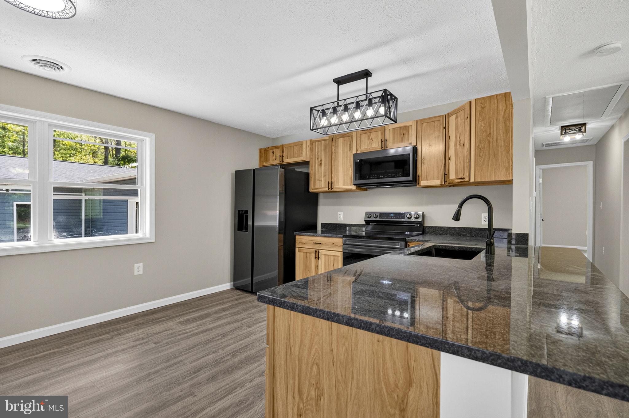 83 Autumn Lane High View, WV 26808 - Photo 11 of 51 Gorgeous new kitchen w/ breakfast bar