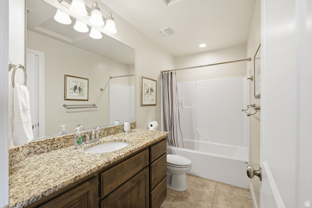 4269 Razor Drive Washington, UT 84780 - Photo 21 of 50 Full bath with vanity, shower / bath combo with shower curtain, and light tile patterned floors