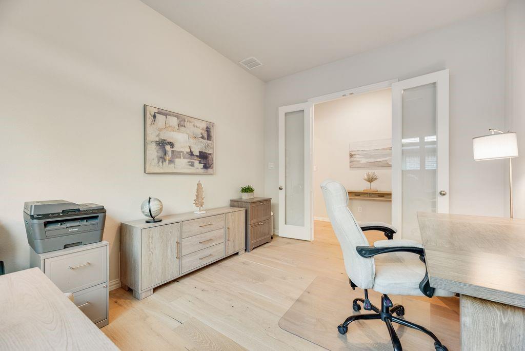 227 Buffalo Boulevard Rhome, TX 76078 - Photo 23 of 39 a bedroom with furniture and a window