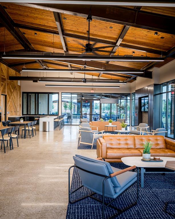 227 Buffalo Boulevard Rhome, TX 76078 - Photo 37 of 39 a living room with furniture and a table