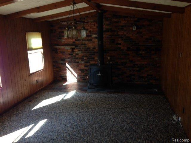 41881 Little Road Clinton Township, MI 48036 - Photo 10 of 28 Family Room with Wood Burner