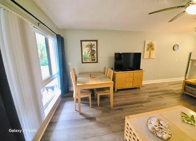 a living room with a couch and a flat screen tv
