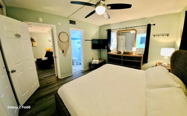 a bedroom with a bed and furniture