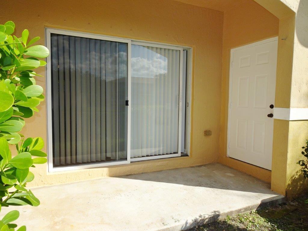 5927 Riverside Avenue Tamarac, FL 33321 - Photo 14 of 15 a view of a house with a outdoor space