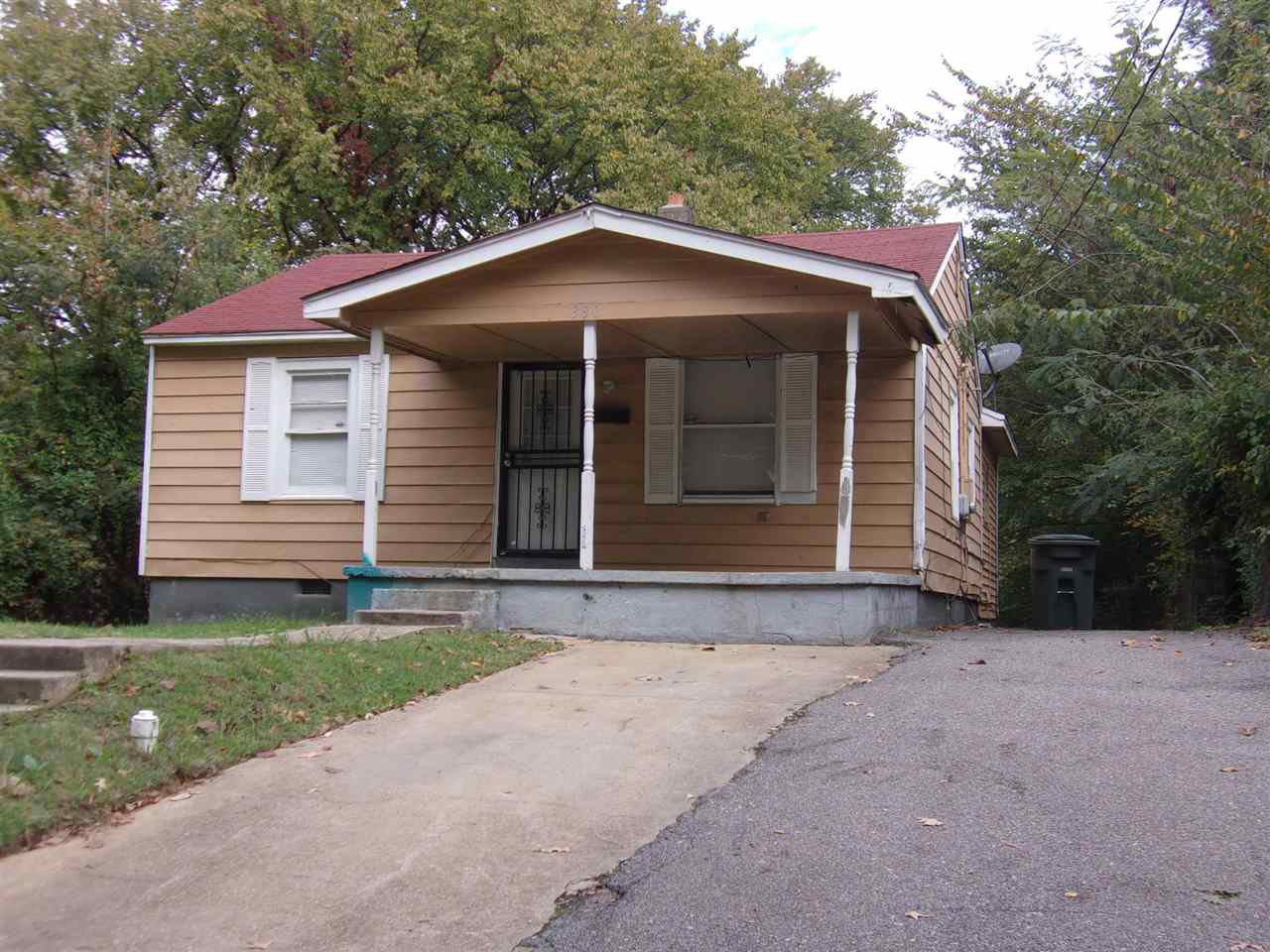 390 Dixie Road Memphis, TN 38109 - Photo 1 of 4 a house with a yard