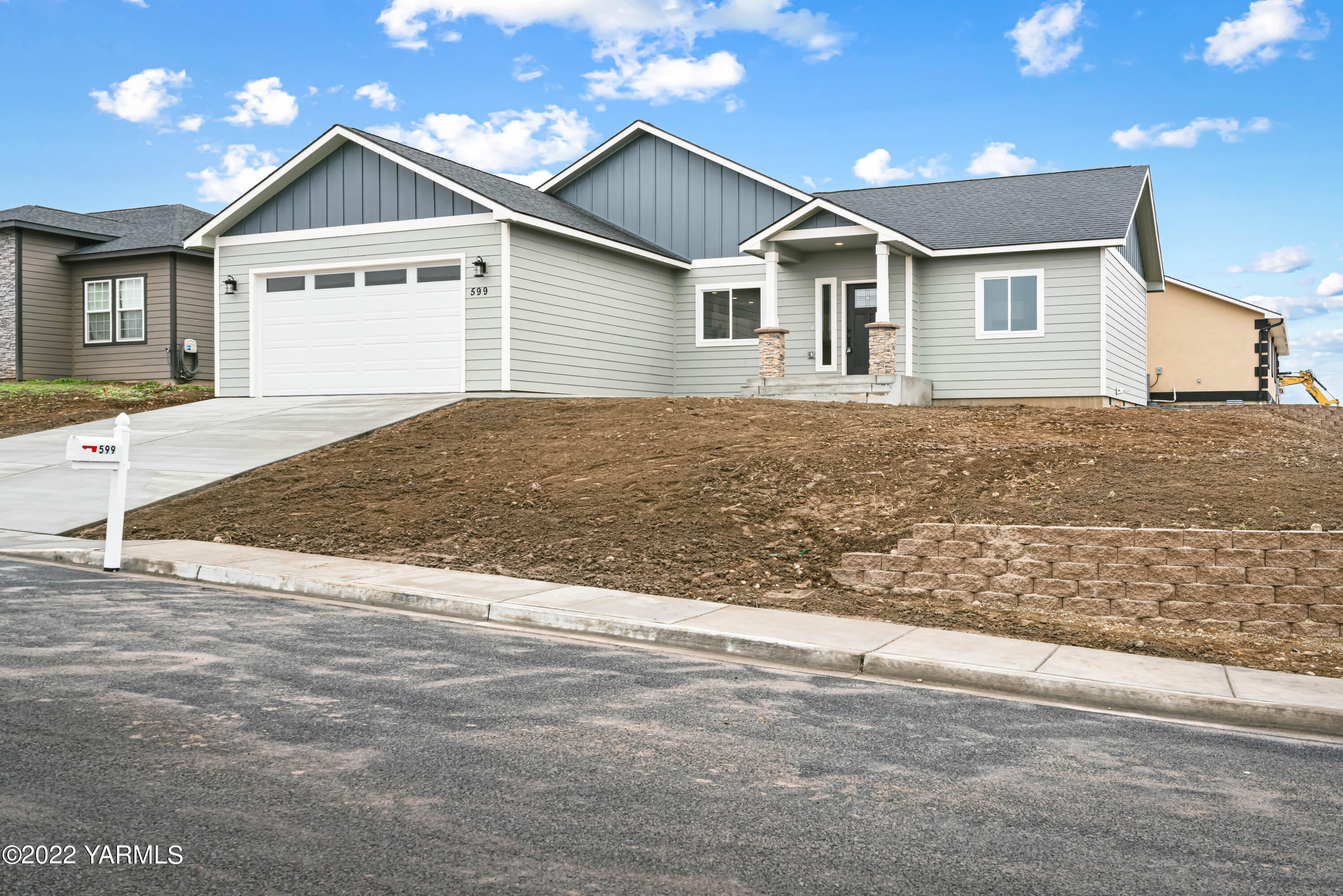 599 Bagley Road Granger, WA 98932 - Photo 2 of 13 a view of a house with a yard