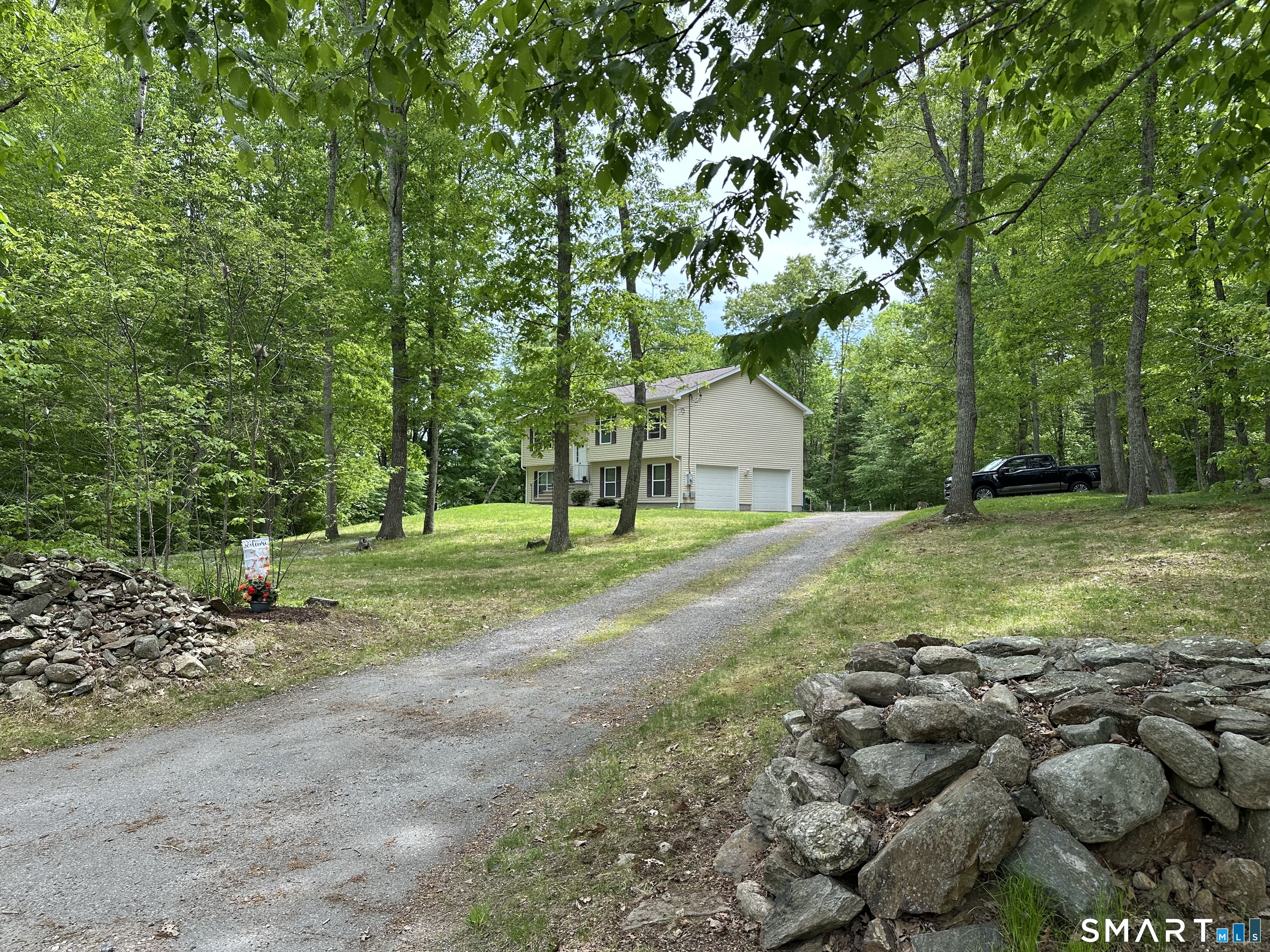 116 Tatnic Hill Road Brooklyn, CT 06234 - Photo 2 of 27 a view of a house with a yard