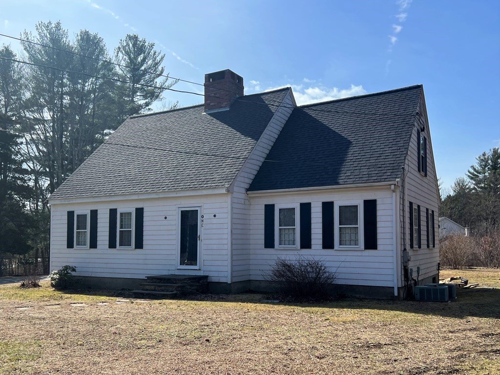 1 Wallace Drive Berkley, MA 02779 - Photo 2 of 8 a front view of a house with a yard