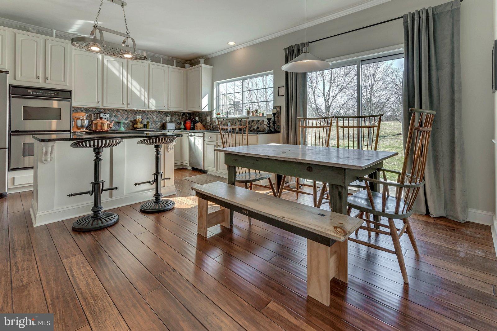 14404 Autumn Gold Road Boyds, MD 20841 - Photo 12 of 30 Large eat-in area plus room at the island!