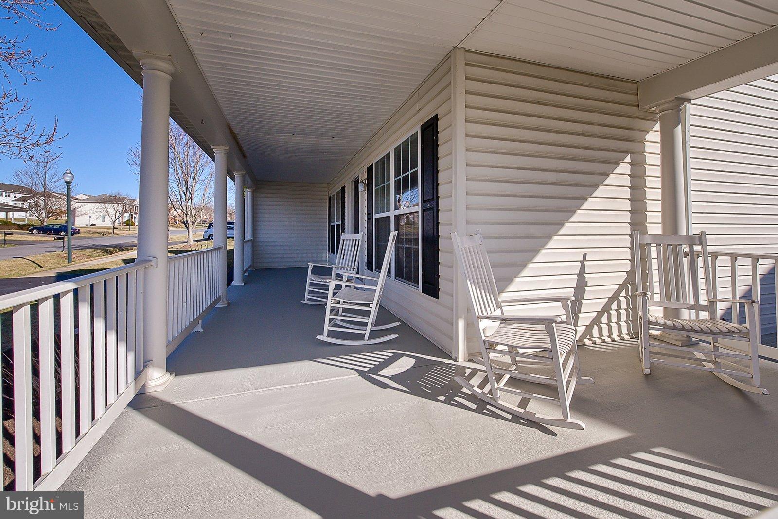 14404 Autumn Gold Road Boyds, MD 20841 - Photo 3 of 30 The extra wide porch lets you find your sunshine!