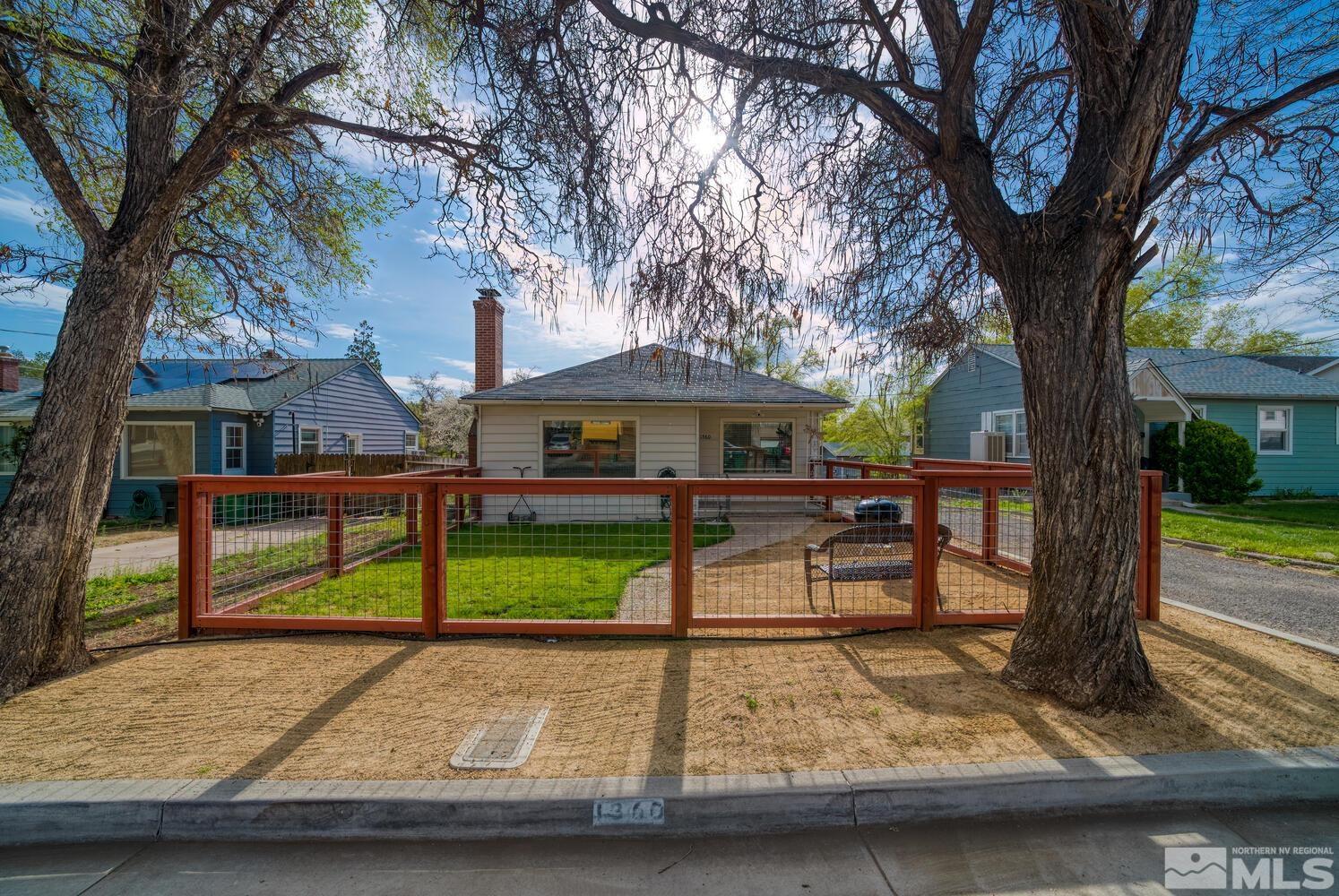 1360 Faland Way Reno, NV 89503 - Photo 1 of 26 a view of house with outdoor seating and trees