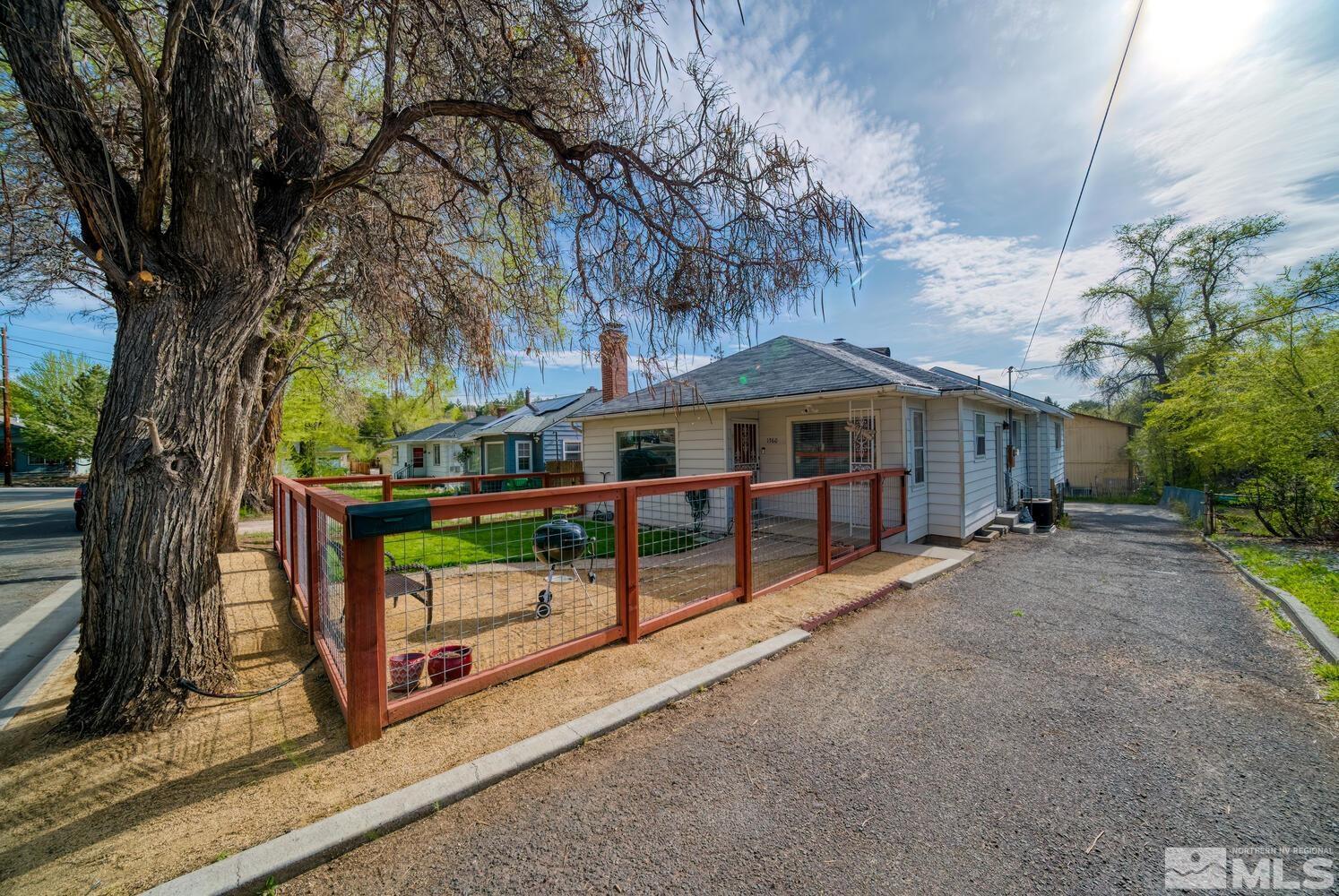 1360 Faland Way Reno, NV 89503 - Photo 2 of 26 front view of a house with a yard
