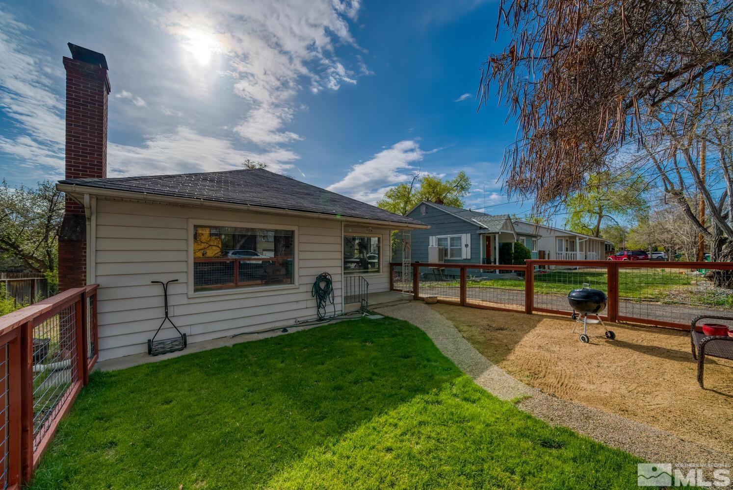 1360 Faland Way Reno, NV 89503 - Photo 4 of 26 a view of a backyard with a garden