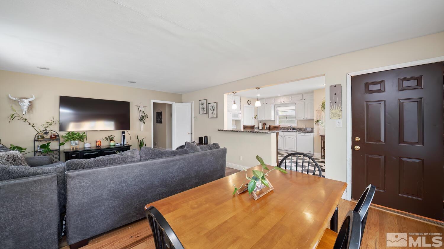 1360 Faland Way Reno, NV 89503 - Photo 9 of 26 a living room with furniture and a flat screen tv