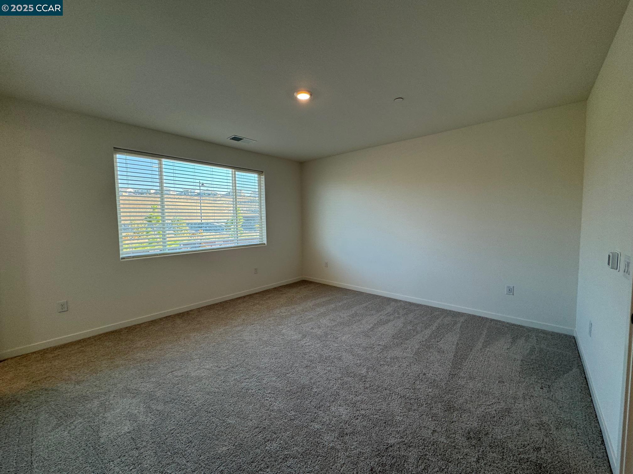 4786 Cantrell Drive Folsom, CA 95630 - Photo 18 of 30 an empty room with a window