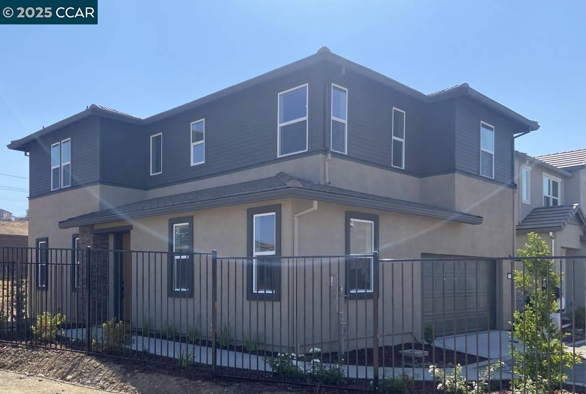 4786 Cantrell Drive Folsom, CA 95630 - Photo 2 of 30 a front view of a house with iron fence