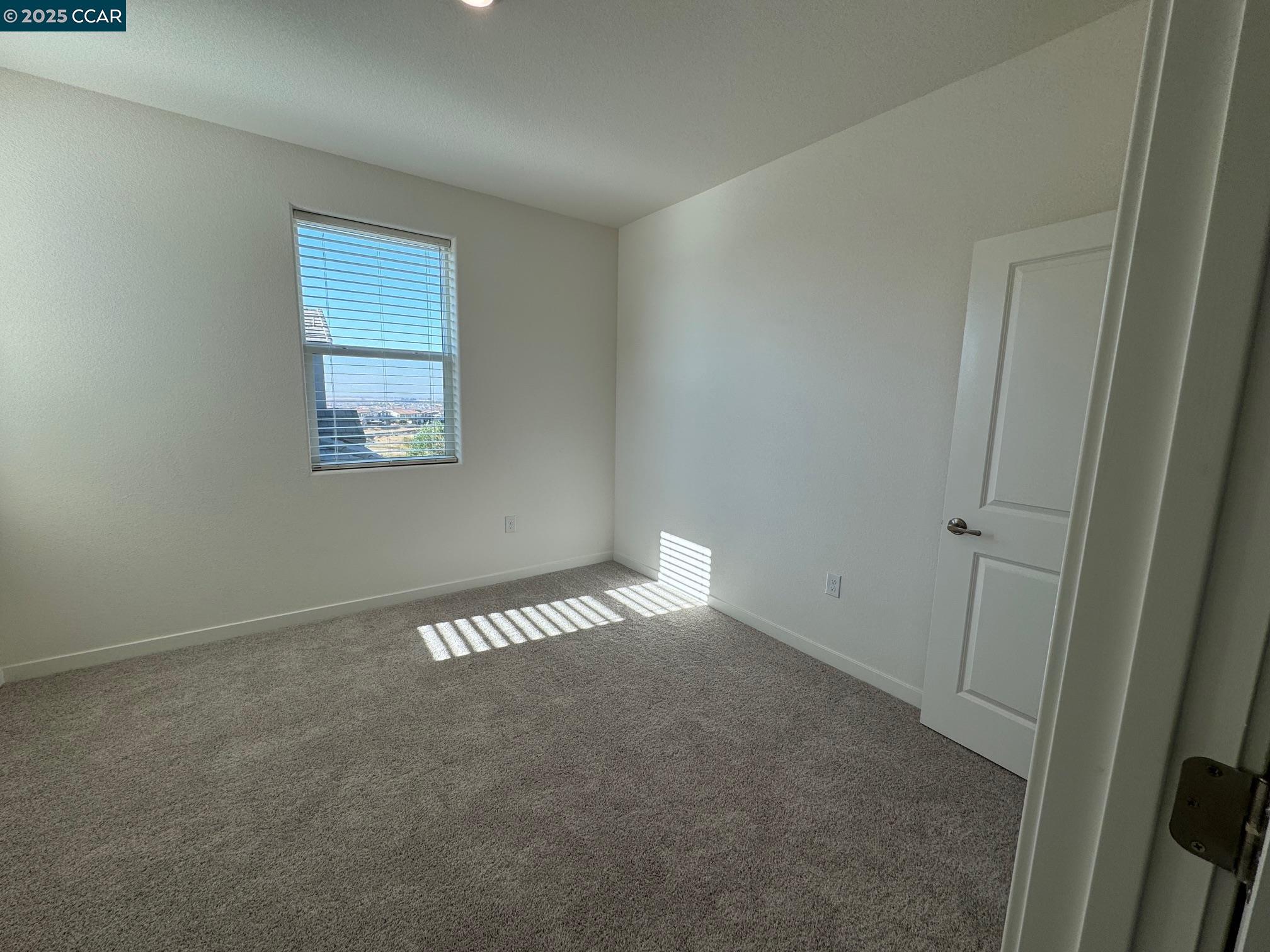 4786 Cantrell Drive Folsom, CA 95630 - Photo 23 of 30 a view of an empty room with a window