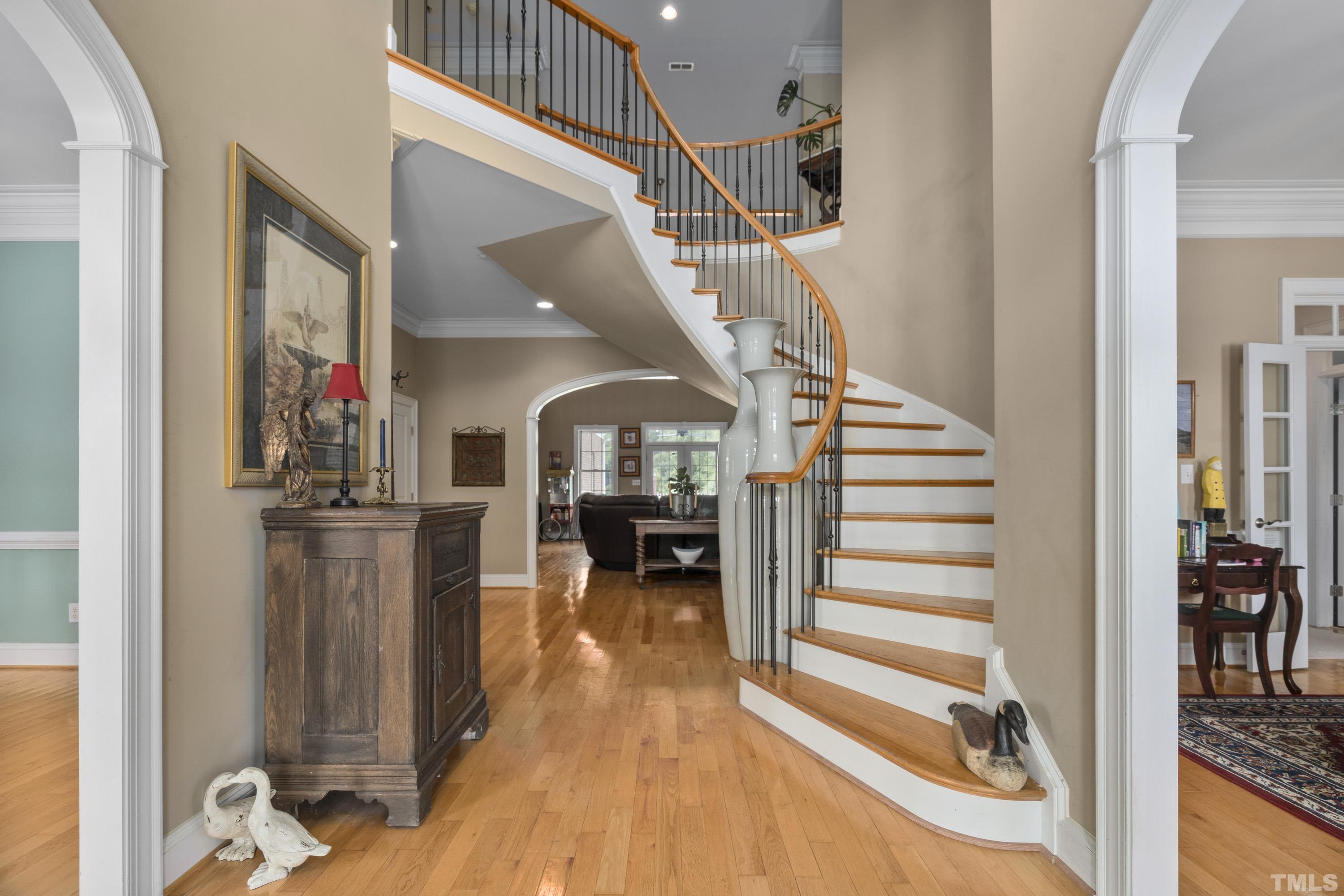 1016 Moss Road Zebulon, NC 27597 - Photo 2 of 30 a view of entryway and hall with wooden floor