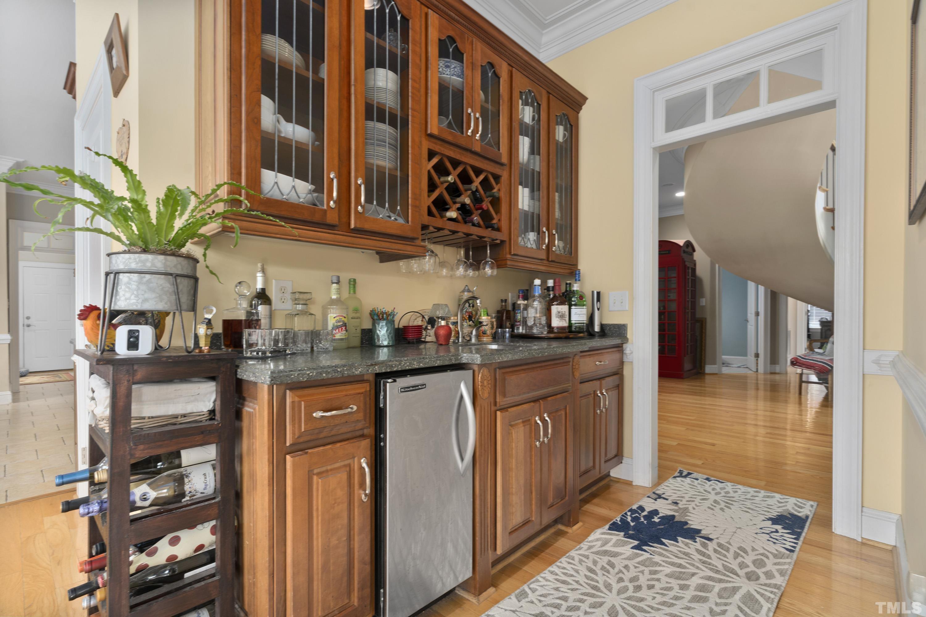 1016 Moss Road Zebulon, NC 27597 - Photo 12 of 30 a kitchen with stainless steel appliances granite countertop a stove a sink and a cabinets